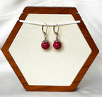 EnJen – Hand-wrapped Round Riverstone Red Earrings on Sterling Silver Leverbacks